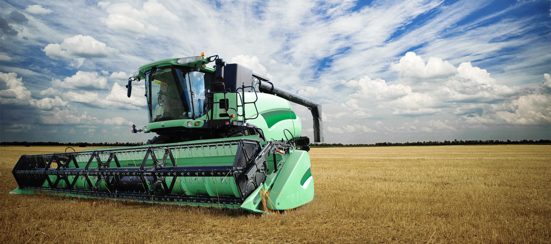 combine harvester in open field